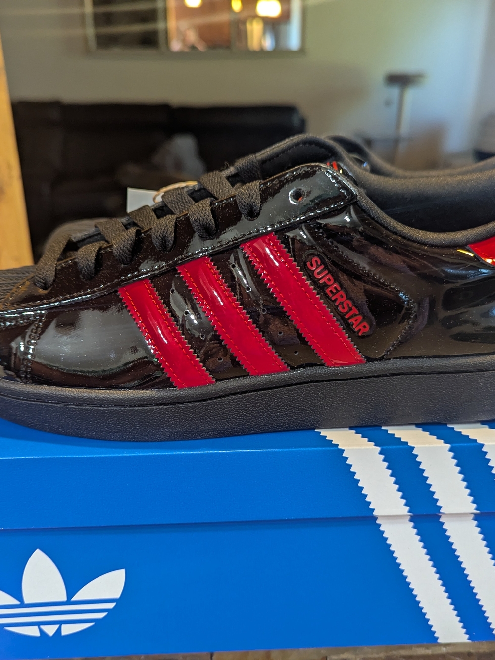 adidas Superstar Men's Sneakers in Black and Red